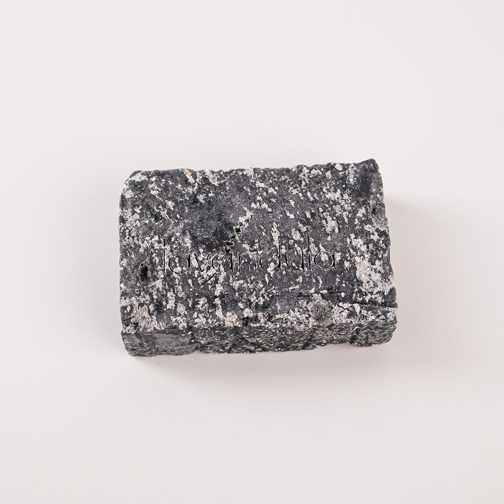 Natural soap with olive oil, mountain thyme, Epsom salts, charcoal, camphor, sage, and thyme essential oils.